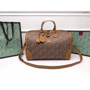 Gucci旅行袋 547953 古馳2020早春新款 米奇GG帆布行李袋 Gucci手袋  gqy3476